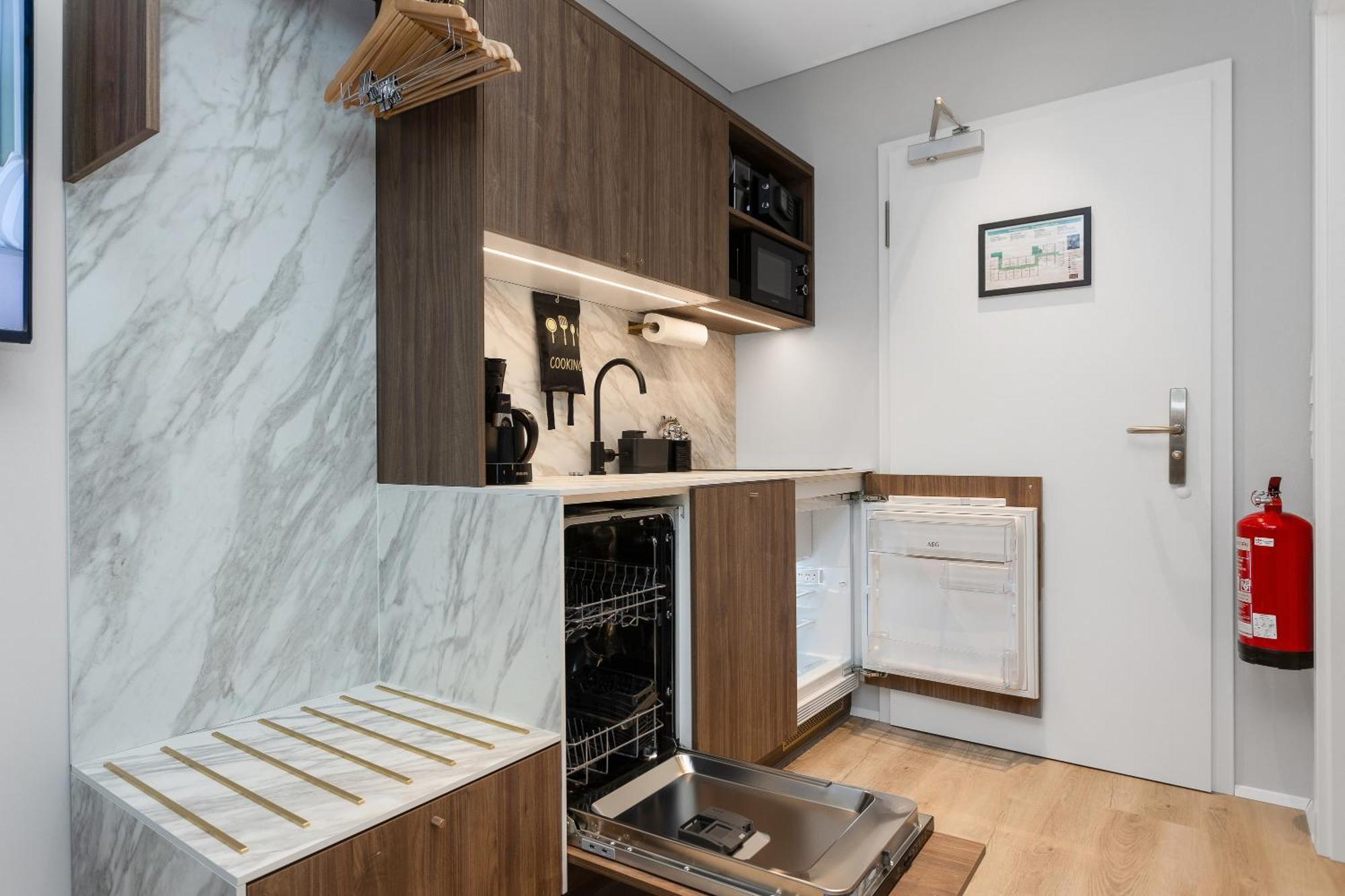 Twin Studio with Full Kitchen and Sofa Bed